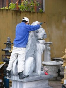 A carver at Marble Mountain