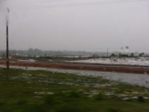 Driving through a rain storm in