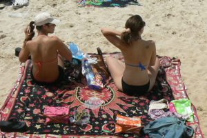 Male and female couples enjoy the clean beaches and warm