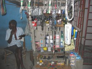 Returning from Jacmel - rural shop and worker