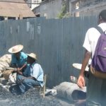 School boy with street vendors