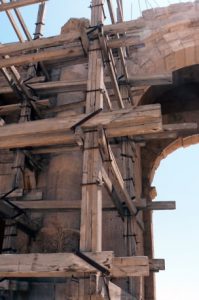 Repair scaffolding on entry gate