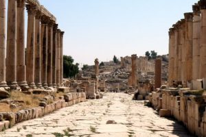 Great corinthian columns line the road