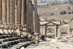 Great corinthian columns line the road