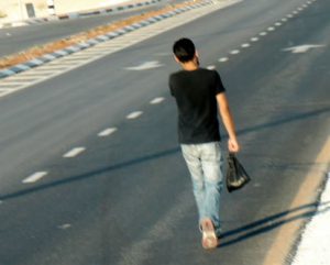 Palestinian worker walking home from Israel