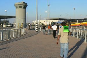 Approaching a major checkpoint between Jerusalem and Ramallah in Palestine. Many