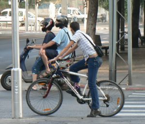 Along Tel Aviv’s Rothschild Boulevard - bikes and boys