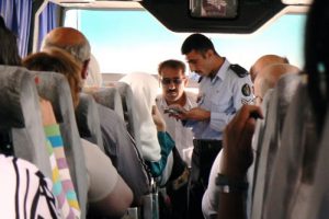 Jordanian immigration officer checks