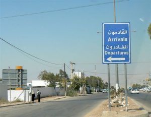 Immigration signpost on Jordanian side