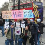 Youth protesting England's entry