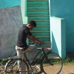Cuba - boy and his bike