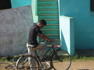 Cuba - boy and his bike