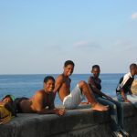 Cuba - boys along the malacon in Havana