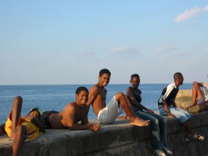 Cuba - boys along the malacon in Havana