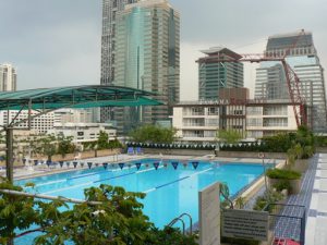 Thailand, Bangkok - rooftop hotel swimming pool  and surrounding buildings