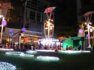 Thailand, Bangkok - young people at a  night cafe outside