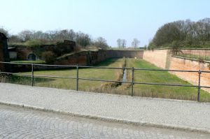 The moat surrounding the ancient walls of Terezin.