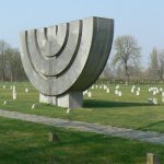 Adjacent to the crematorium is the large Jewish cemetery.