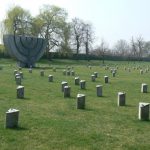 Adjacent to the crematorium is the large Jewish cemetery.