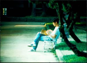 Taipei guy reading in park