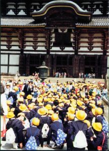 Close-up of the entry to Todai-ji Buddhist Temple. The people