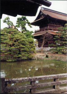 Peaceful pond at the Zenko-ji Buddhist Temple.