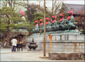 Buddha statues at the Zenko-ji Buddhist Temple. Each statue is