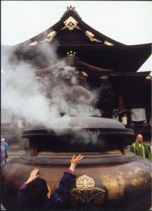 Large burner for memorial incense at Zenko-ji Buddhist Temple.