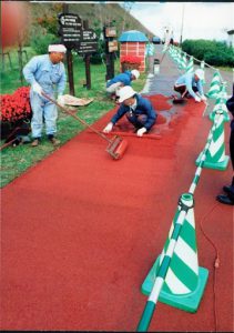 Painting the asphalt walk. Why?