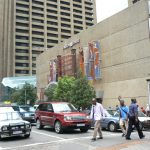 City streets; note new Range Rover car.