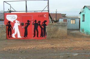 Cell phone company advert in Soweto. Cell phone are a