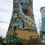 Decorated unused power plant cooling tower.