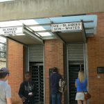 Bi-racial entry to the Apartheid Museum.