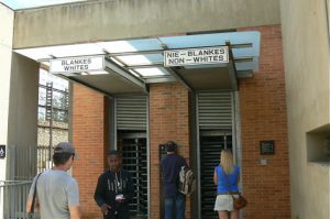 Bi-racial entry to the Apartheid Museum.