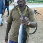 Fisherman with his catch.