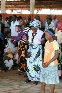 Praying at church service is intense and musical for many.