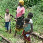Children along the tracks; the girls learn at an early