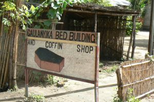 Bed and coffin shop in Mangochi market.