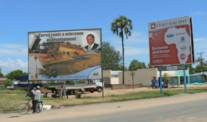 First billboard praises paved roads: ???????Tarred roads a milestone in