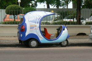 Unusual shapped tuk-tuk taxi.