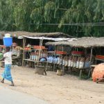 Local rural food stands, mostly potatoes and onions.