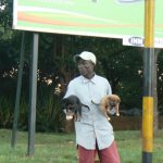 Roadside guy selling puppies.