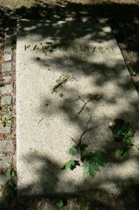 Close-up of Blixen's gravestone on the museum estate; there are