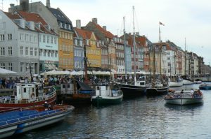 Picturesque harbor-side shops and houses in the traditional style.