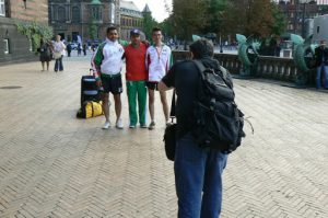 Gay journalist Michael Luongo busy taking photos of Mexican athletes.