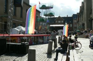 Rainbow flags in city center.