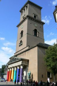 Lutheran Cathedral wrapped in gay colors during Gay Pride and