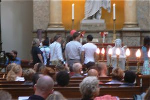 Same-sex couples waiting in line for a blessing on their