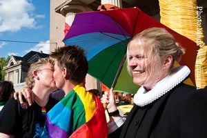 Couples celebrated their blessing afterwards outside the cathedral with priest.