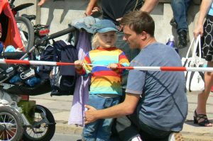 Gay parents were happily visible with their kids.